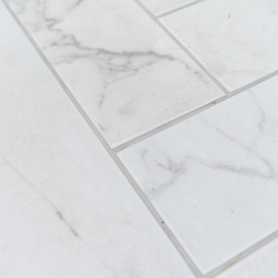 Dortmund Carrara Herringbone 9.9 x 49.2cm Porcelain Tile - 0.73sqm perbox